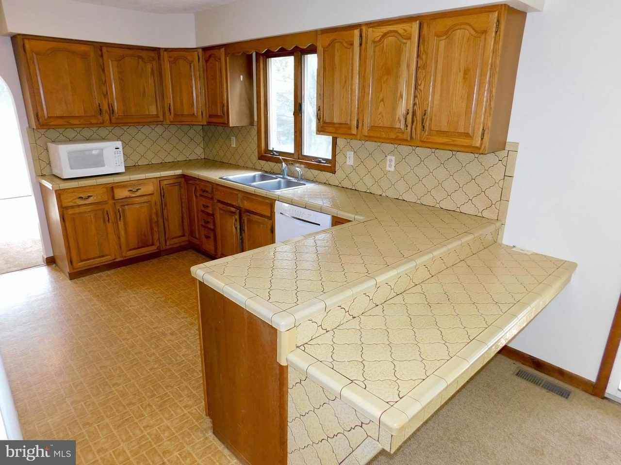 715 Shawnee Brooke Dr - Photo 4 of 9