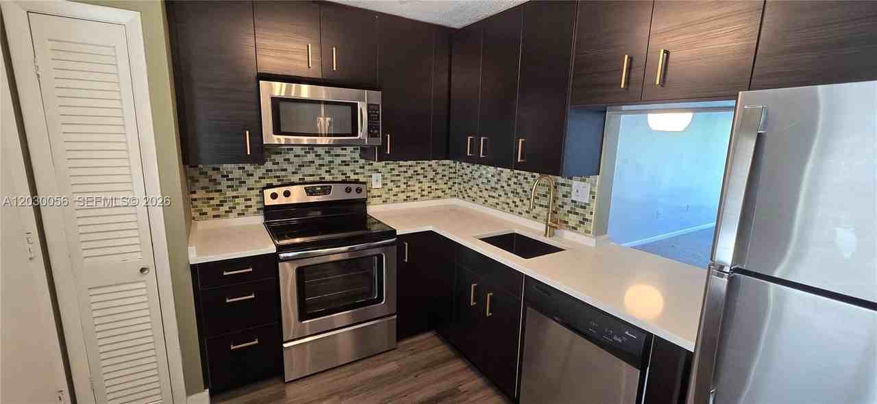 1201 Ne 191st St #G306 - Photo 2 of 20