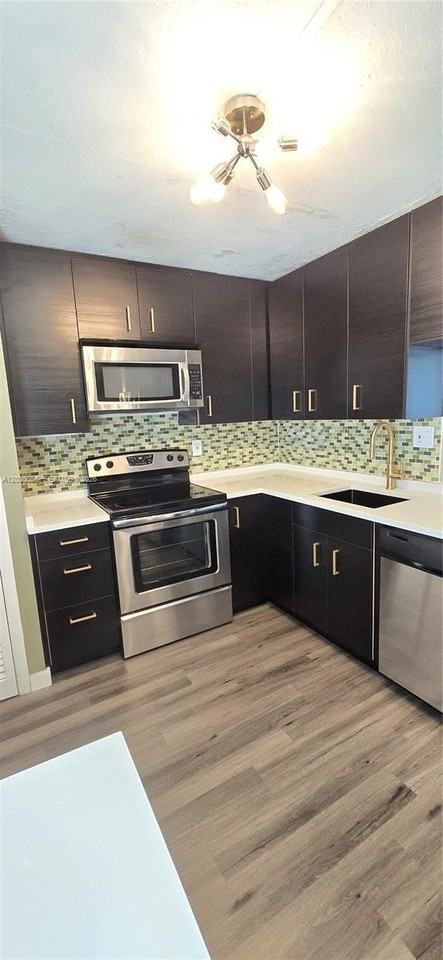 1201 Ne 191st St #G306 - Photo 5 of 20