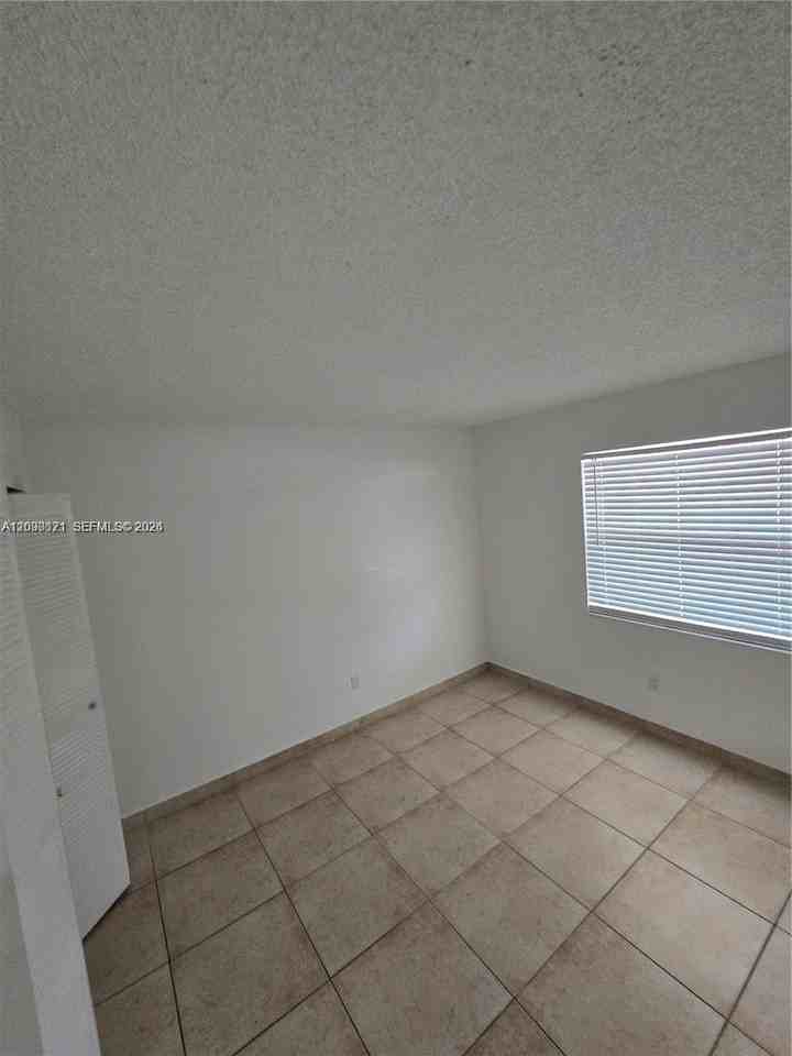 911 Ne 209th Ter #204-27 - Photo 6 of 13
