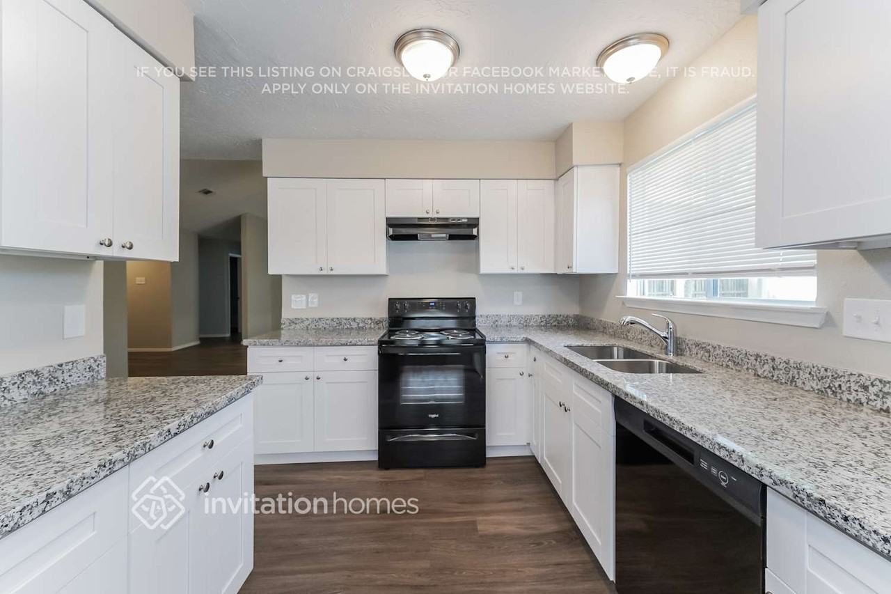 7011 Pickett Dr - Photo 5 of 16