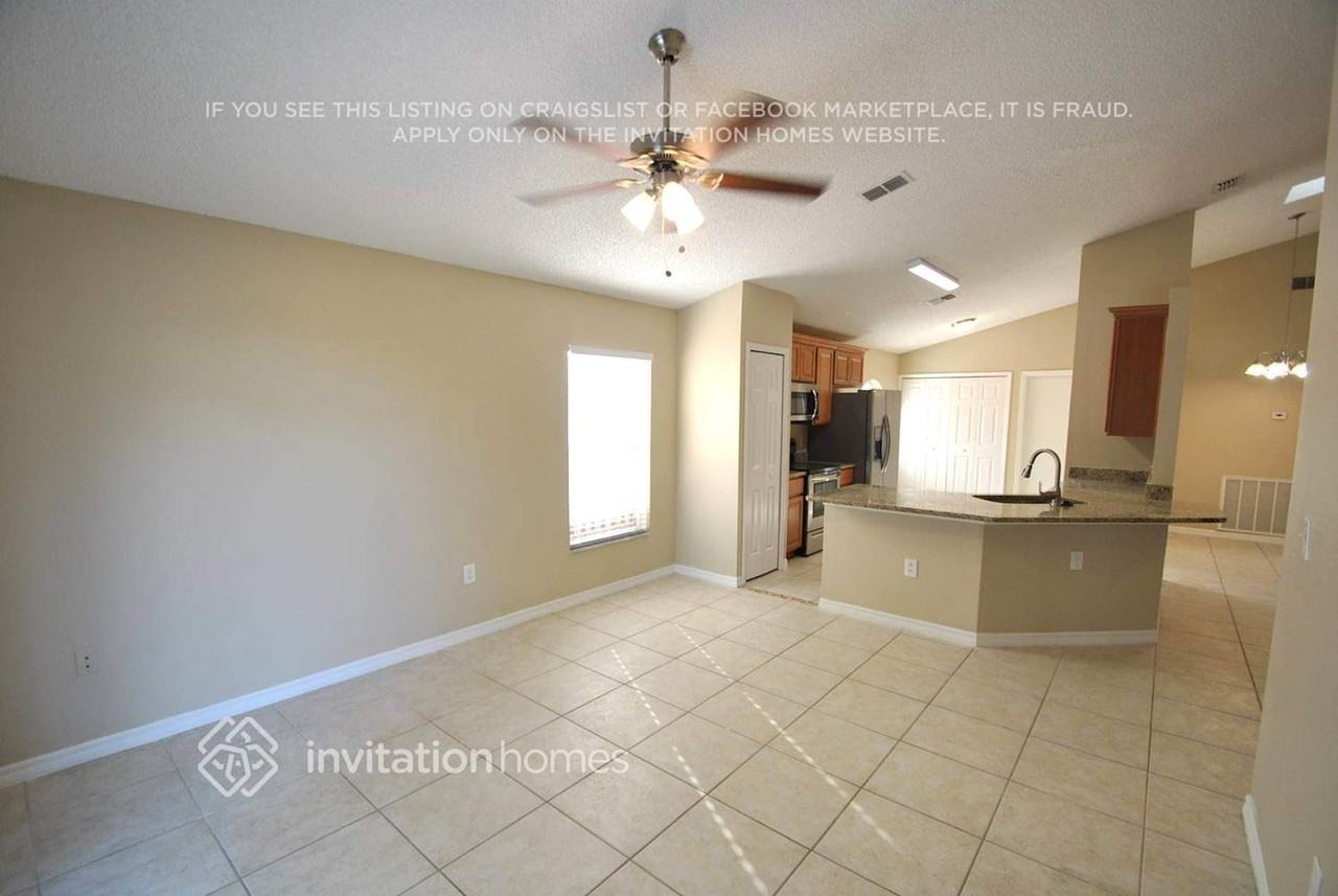 6879 Raccoon Ct - Photo 3 of 9