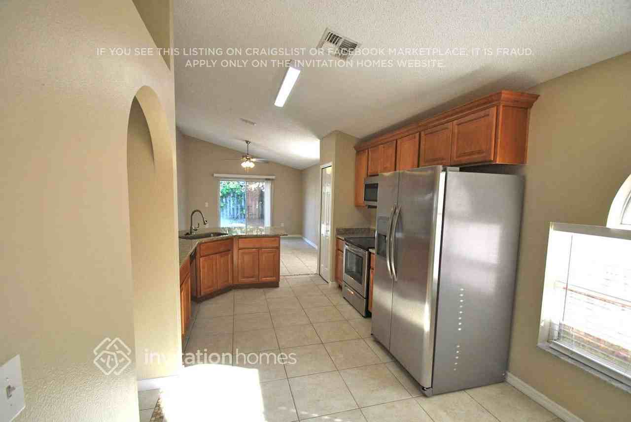 6879 Raccoon Ct - Photo 4 of 9