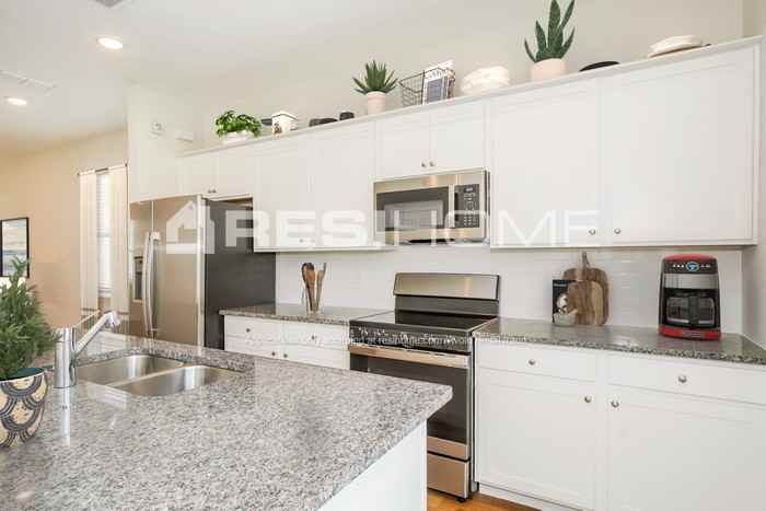 8102 Arrowwood Loop - Photo 4 of 18