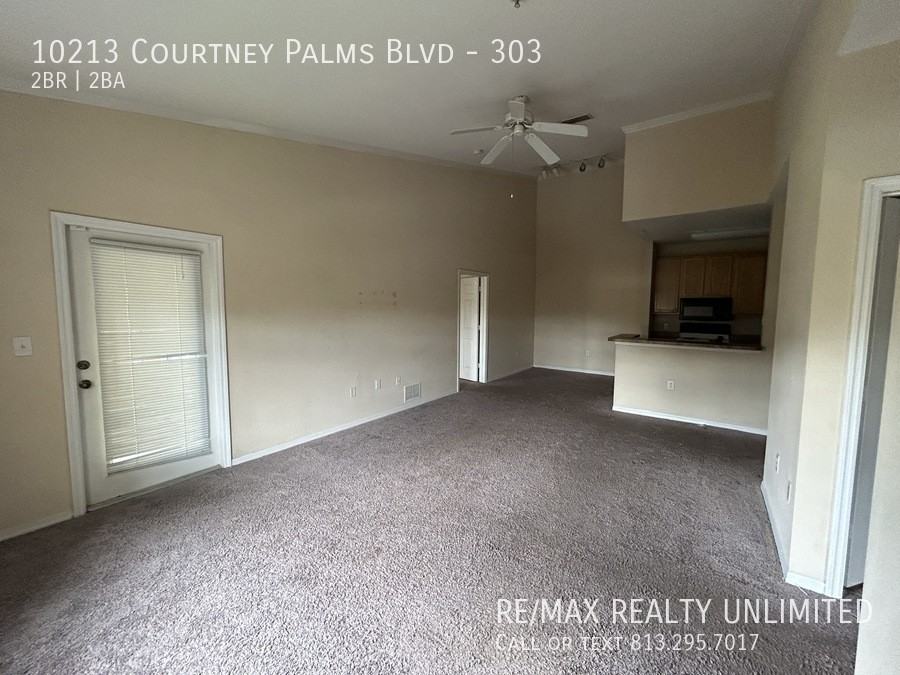 10213 Courtney Palms Blvd #303 - Photo 3 of 33