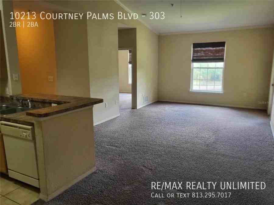 10213 Courtney Palms Blvd #303 - Photo 5 of 33