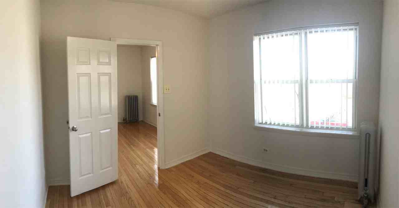 71st and Rhodes LLC - Photo 2 of 4