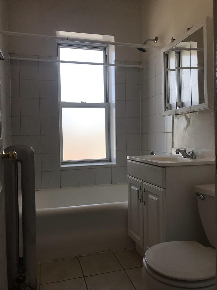 71st and Rhodes LLC - Photo 3 of 4