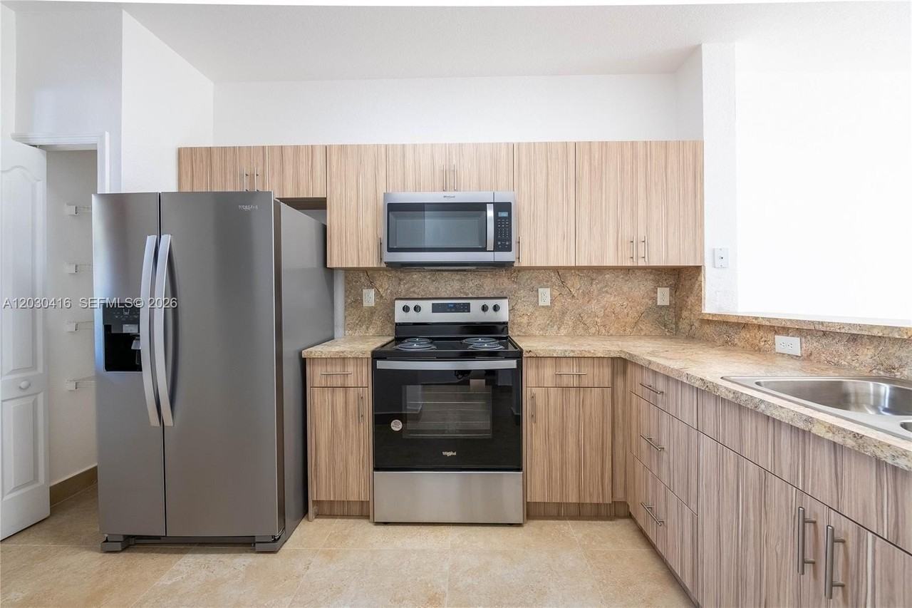 7200 Nw 177th St #109-7 - Photo 2 of 14
