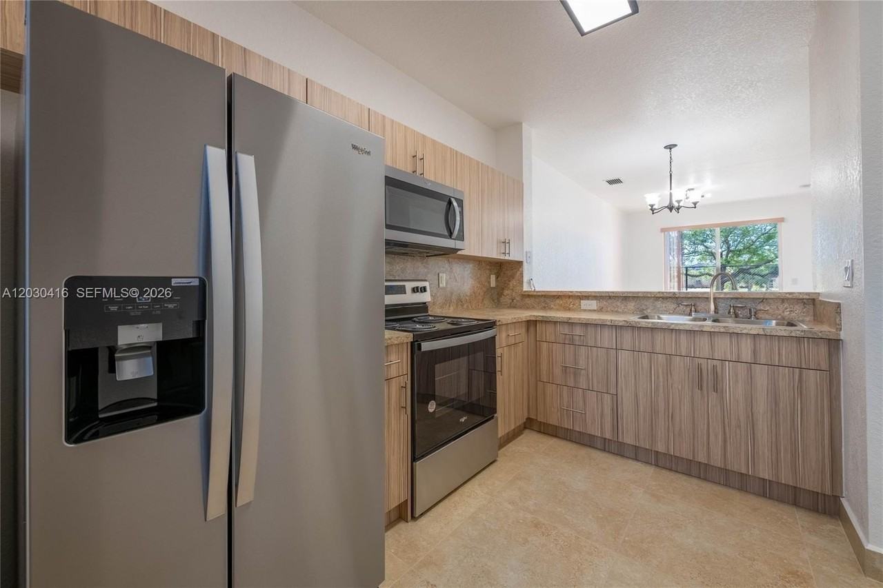 7200 Nw 177th St #109-7 - Photo 3 of 14