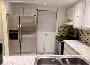 1035 W 77th St #211 - Photo 1 of 1