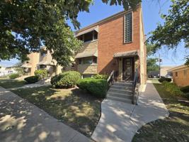 featured image of 7124 W Jarvis Ave #G