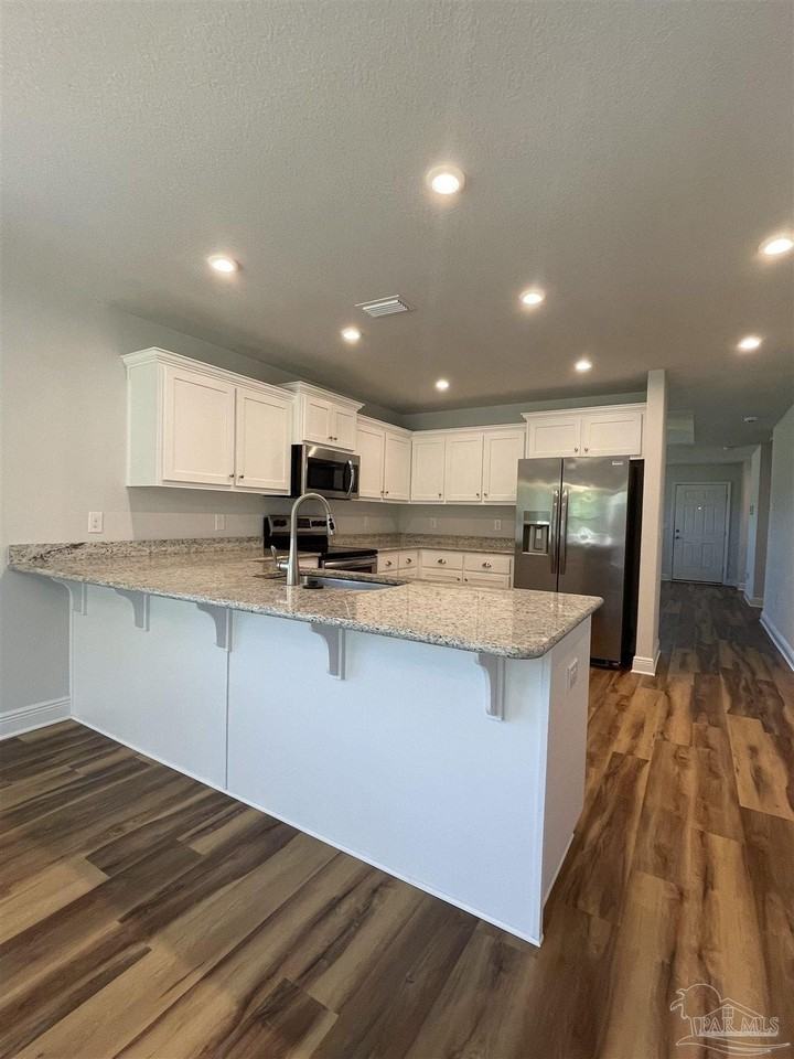 7130 Sonny Dr - Photo 5 of 24