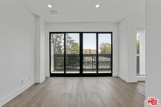 1447 N Martel Ave - Photo 4 of 8