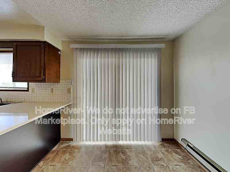 12620 E 31st Ave - Photo 4 of 23