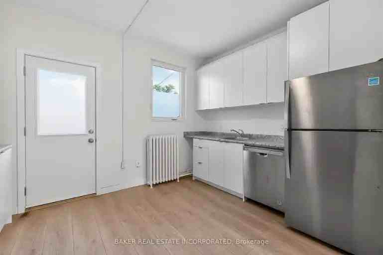 922 Queen St E #2 - Photo 2 of 13