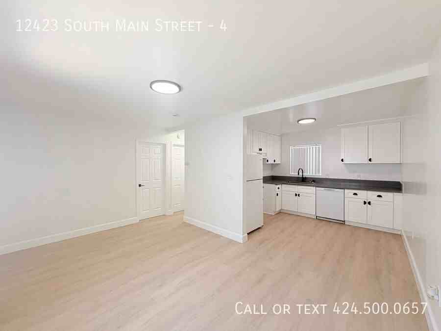 12423 S Main St #4
