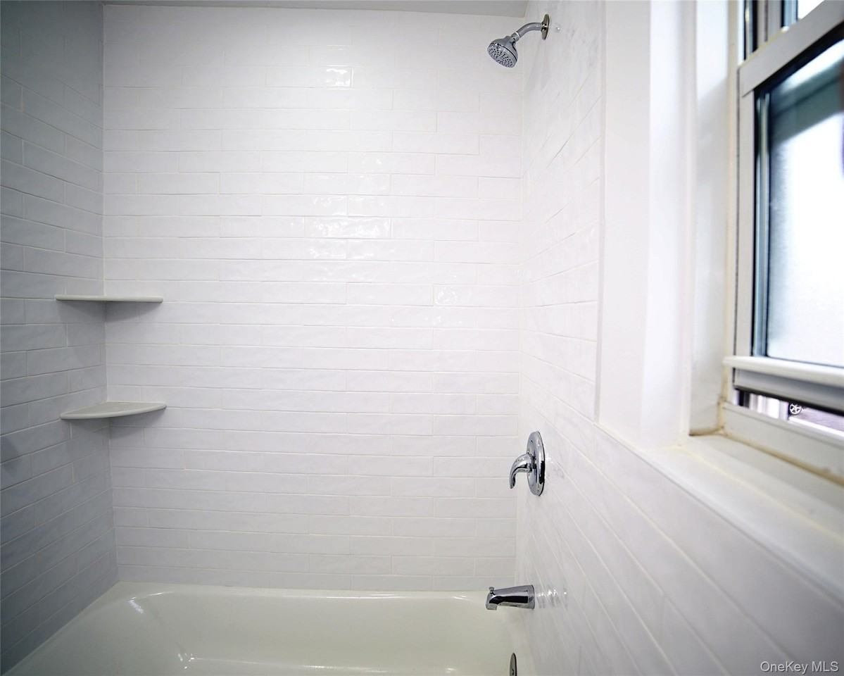 7219 Little Neck Pkwy #1stFL - Photo 5 of 15