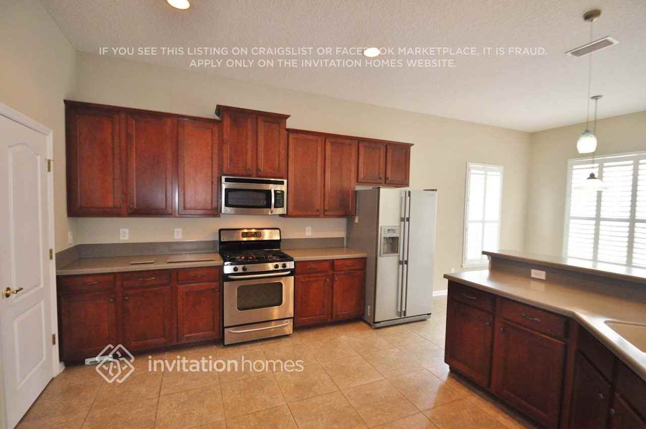 11315 Claudine Ct - Photo 3 of 9