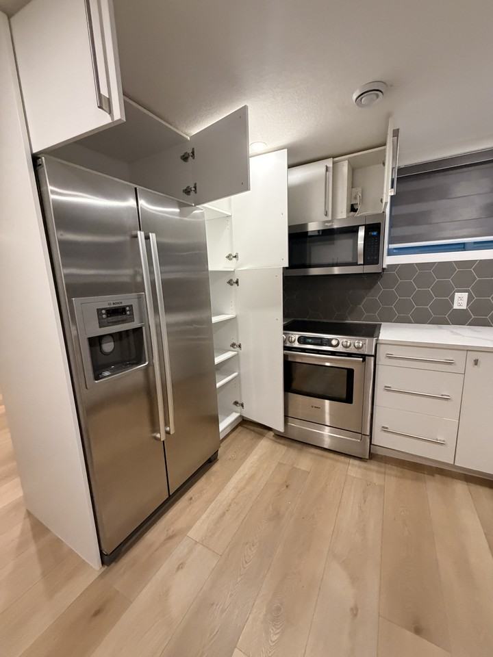 44 Deer Lane Close SE Basement Unit with Garage - Photo 3 of 19