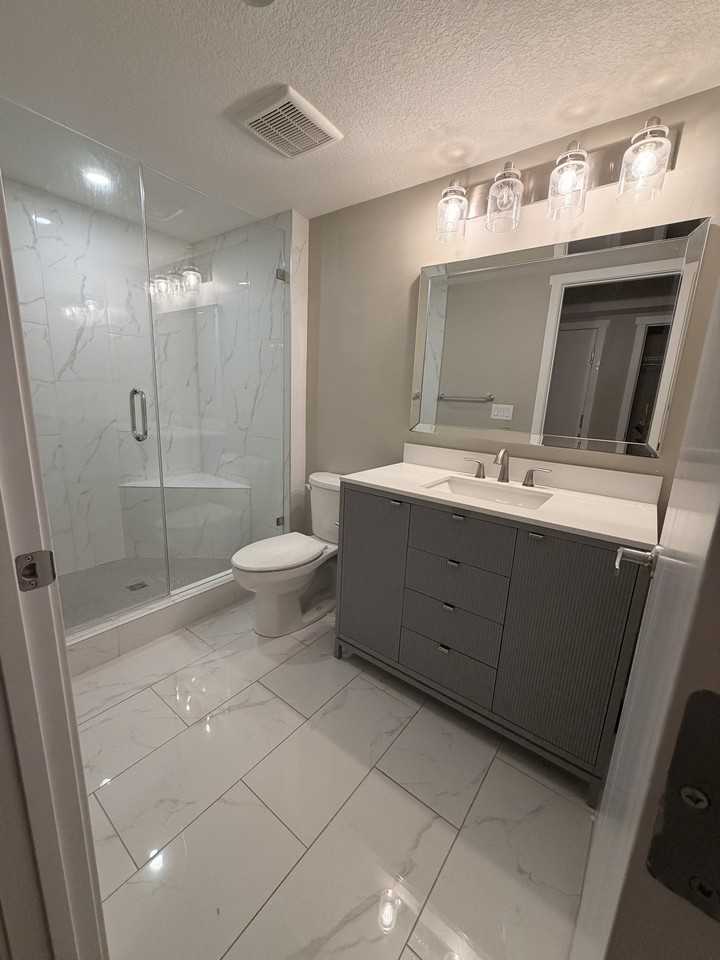 44 Deer Lane Close SE Basement Unit with Garage - Photo 5 of 19