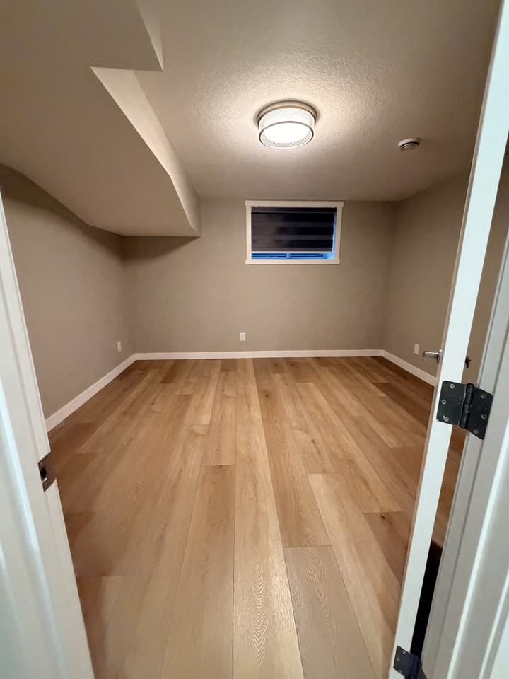 44 Deer Lane Close SE Basement Unit with Garage - Photo 7 of 19