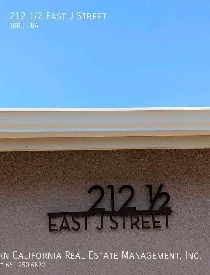 212 1/2 E J St