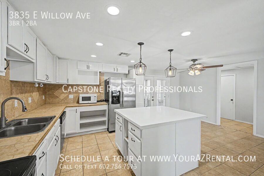 3835 E Willow Ave - Photo 5 of 16