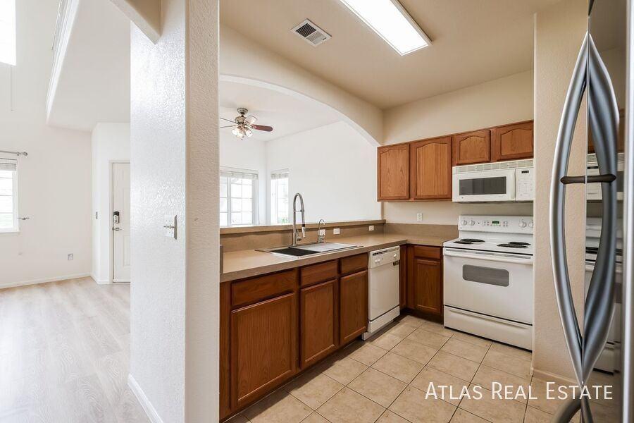 1405 S Chambers Rd #103 - Photo 4 of 14