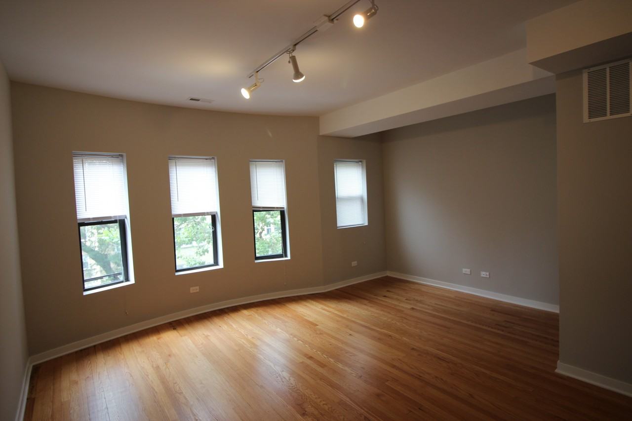 6449 N Claremont Ave #3 - Photo 2 of 12
