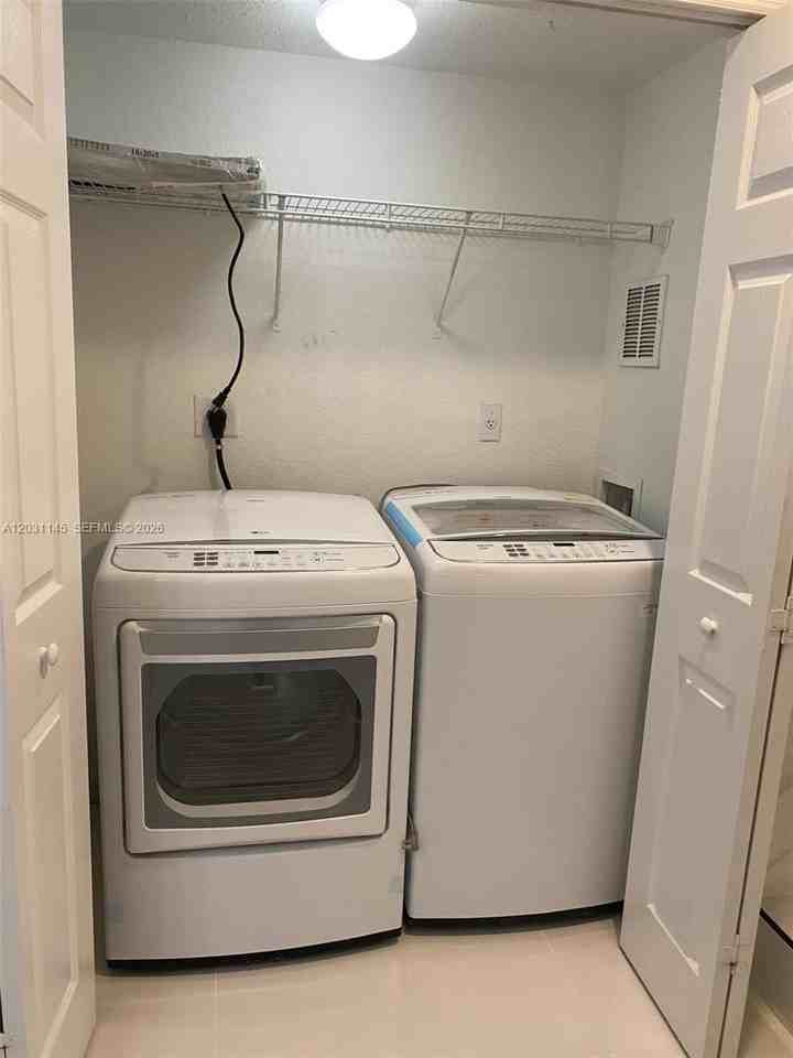 11201 Nw 83rd St #202 - Photo 6 of 13