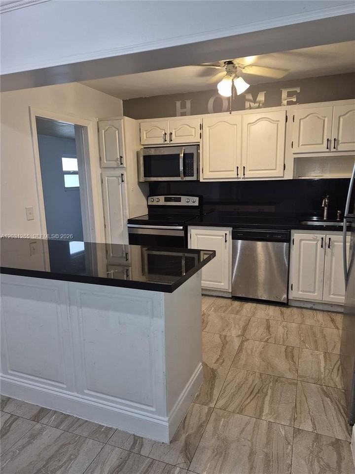 3035 Nw 68th St #12D - Photo 2 of 14