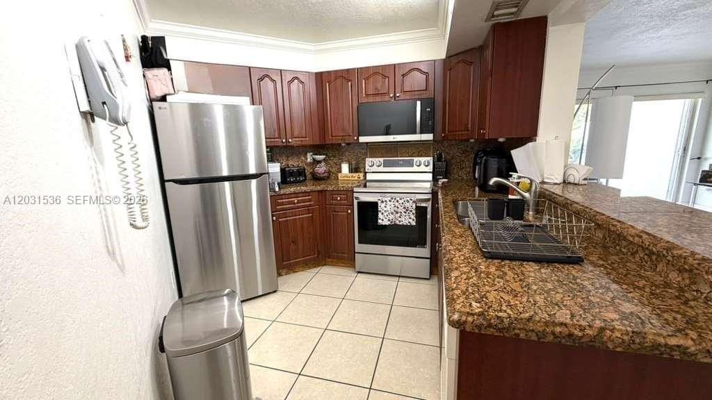 9711 Fontainebleau Blvd #D105 - Photo 2 of 17