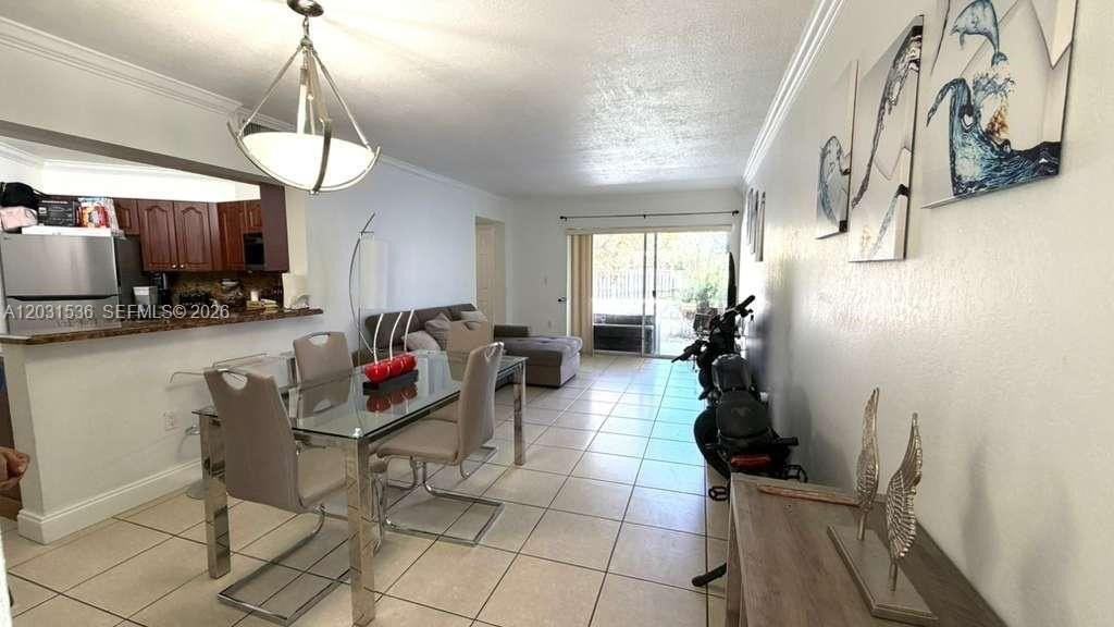 9711 Fontainebleau Blvd #D105 - Photo 3 of 17