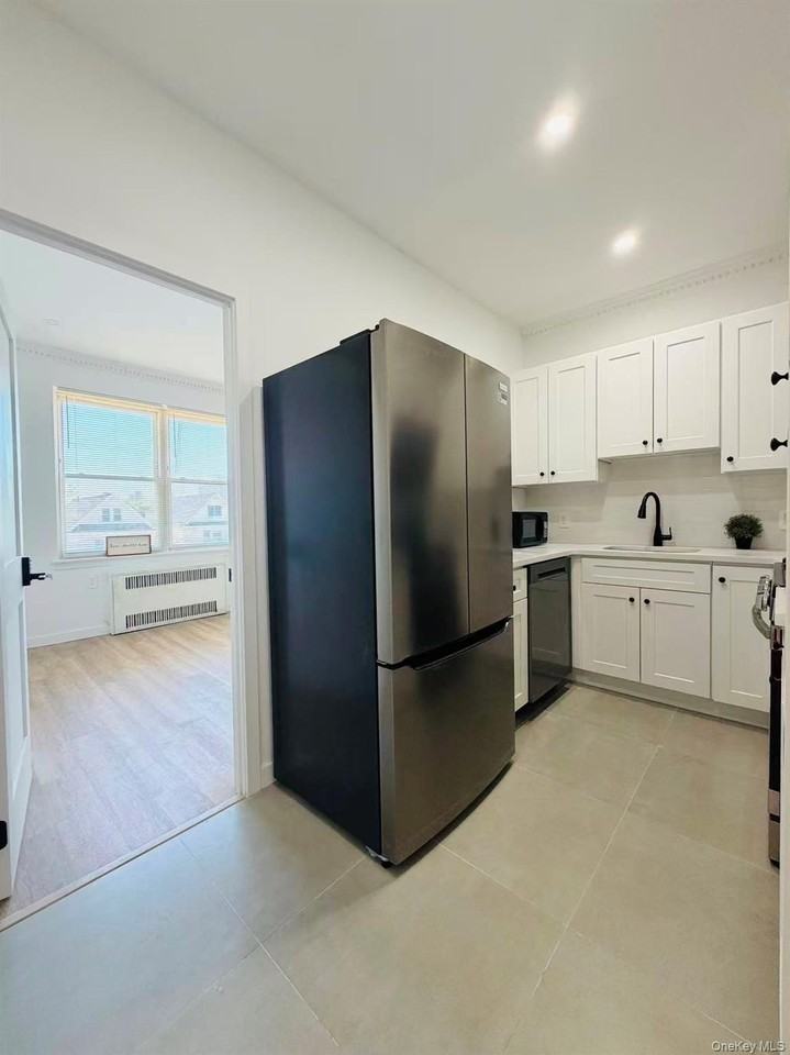 6024 Wetherole St #3rdFL - Photo 3 of 10