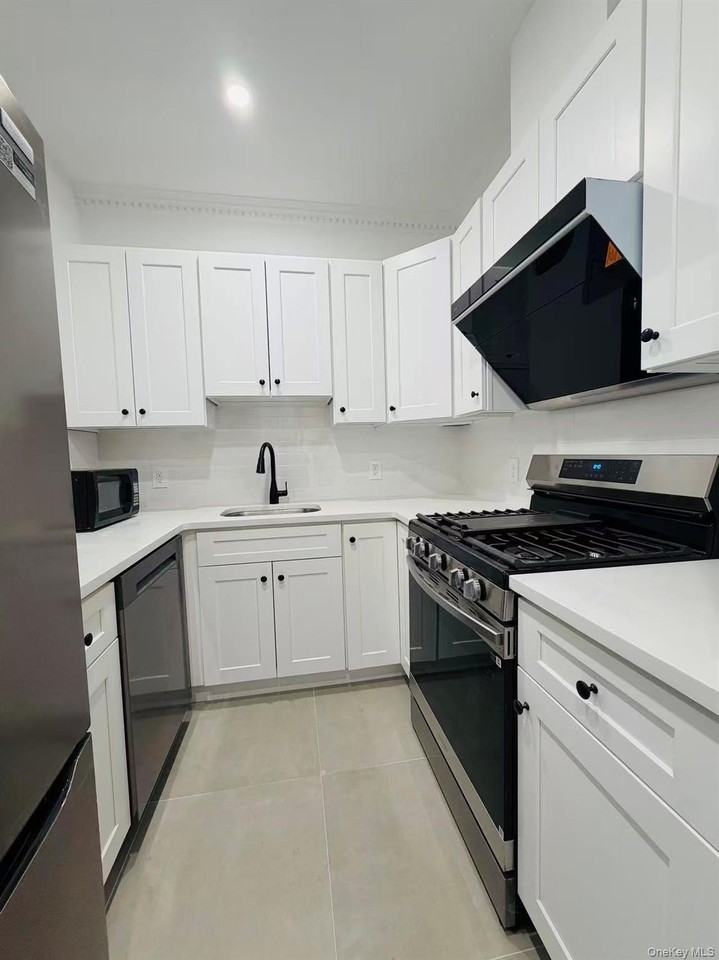 6024 Wetherole St #3rdFL - Photo 4 of 10
