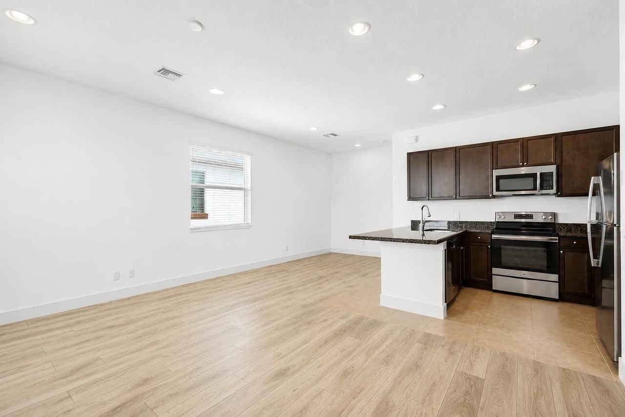 6044 Curie Pl - Photo 3 of 23