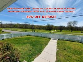featured image of 203 Riverside Dr