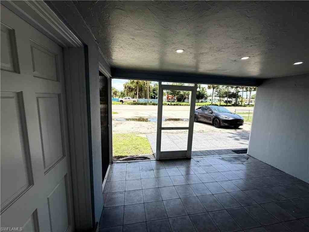 4375 Golden Gate Pkwy - Photo 3 of 7