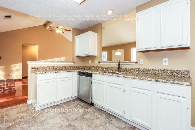4965 Briar Oaks Ln - Photo 5 of 13