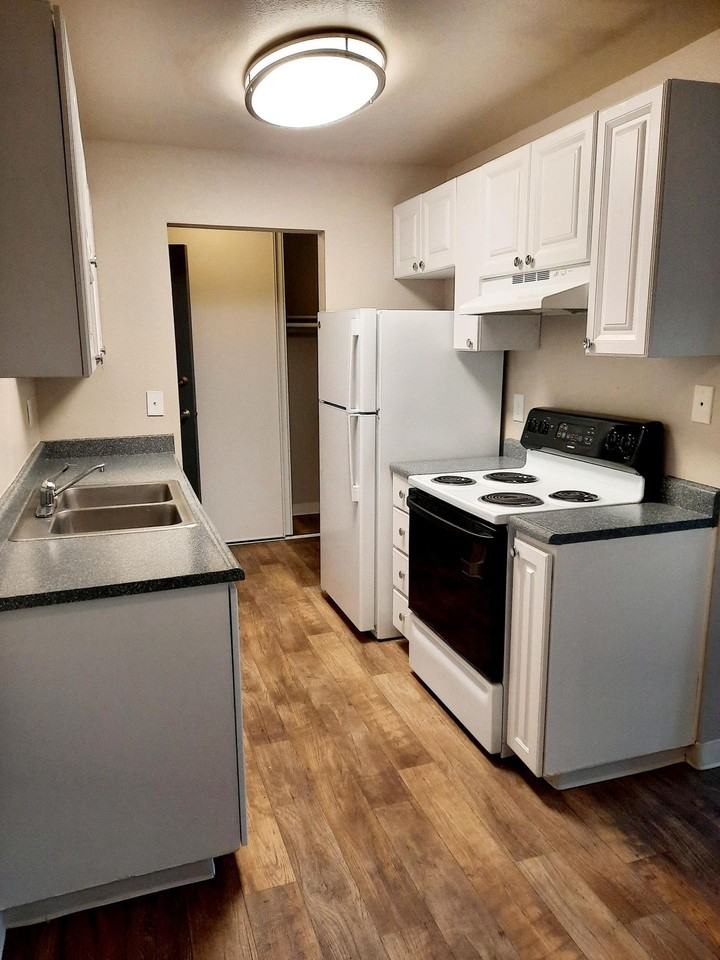 SUNDANCER APARTMENTS - Photo 2 of 17