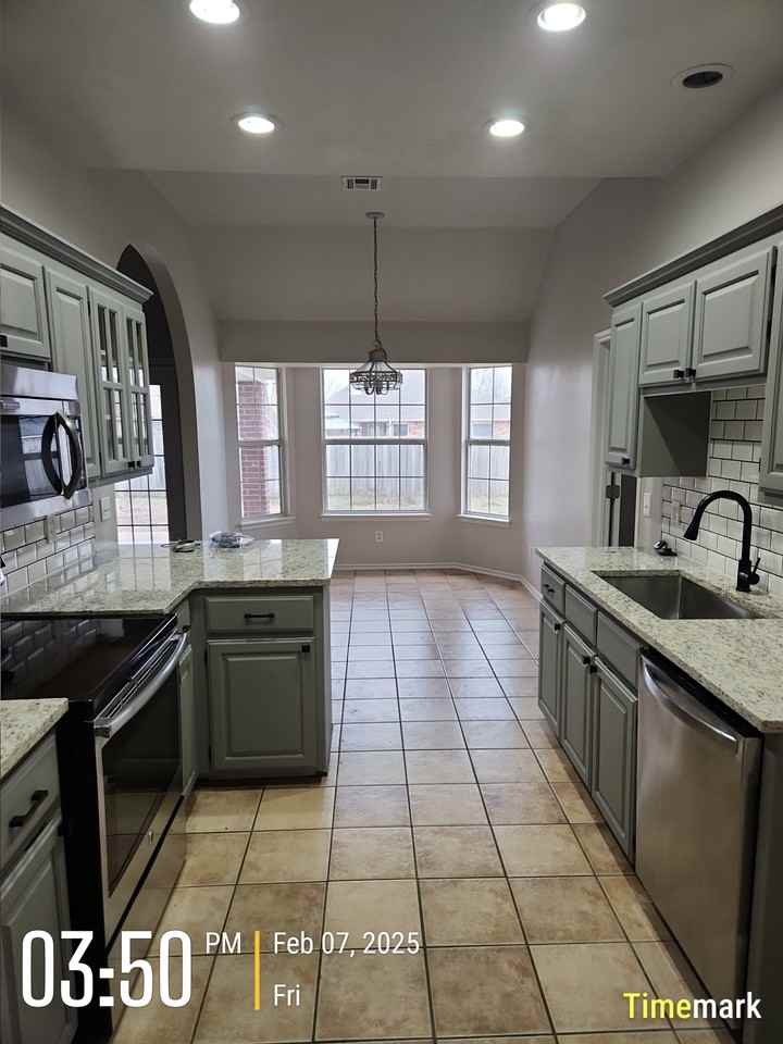 12002 N 109th East Ave #1 - Photo 3 of 11