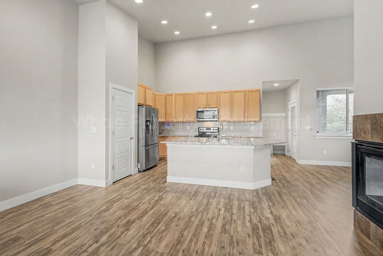 9985 E 59th Ave - Photo 2 of 31
