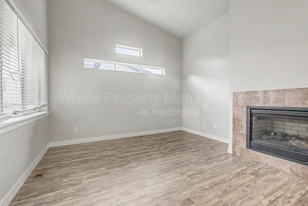 9985 E 59th Ave - Photo 3 of 31