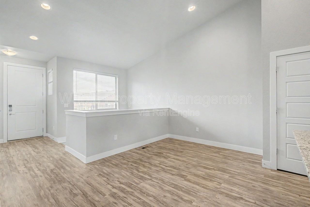 9985 E 59th Ave - Photo 4 of 31