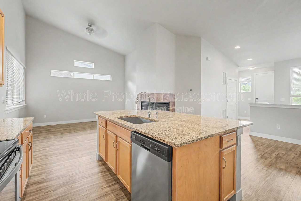 9985 E 59th Ave - Photo 7 of 31