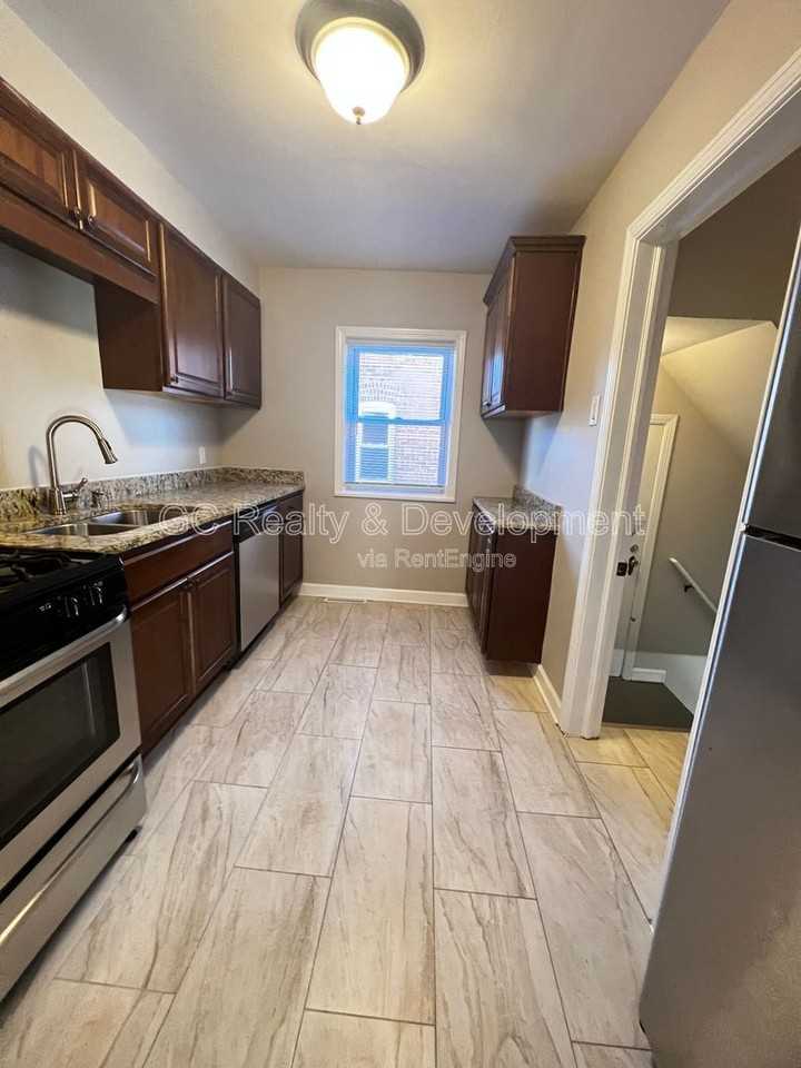 9121 S Utica Ave - Photo 6 of 25