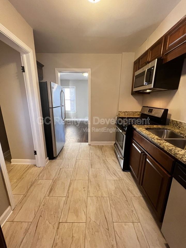9121 S Utica Ave - Photo 7 of 25