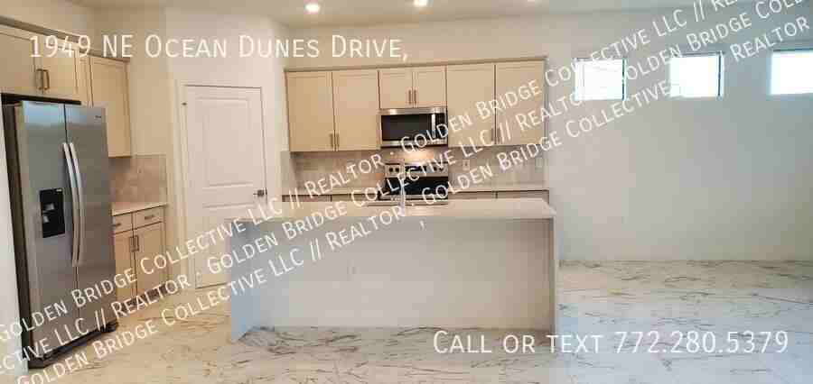 1949 Ne Ocean Dunes Dr - Photo 3 of 10