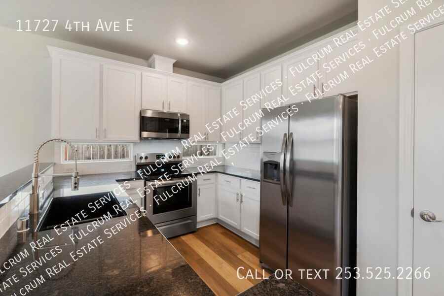 11727 4th Ave E - Photo 5 of 19